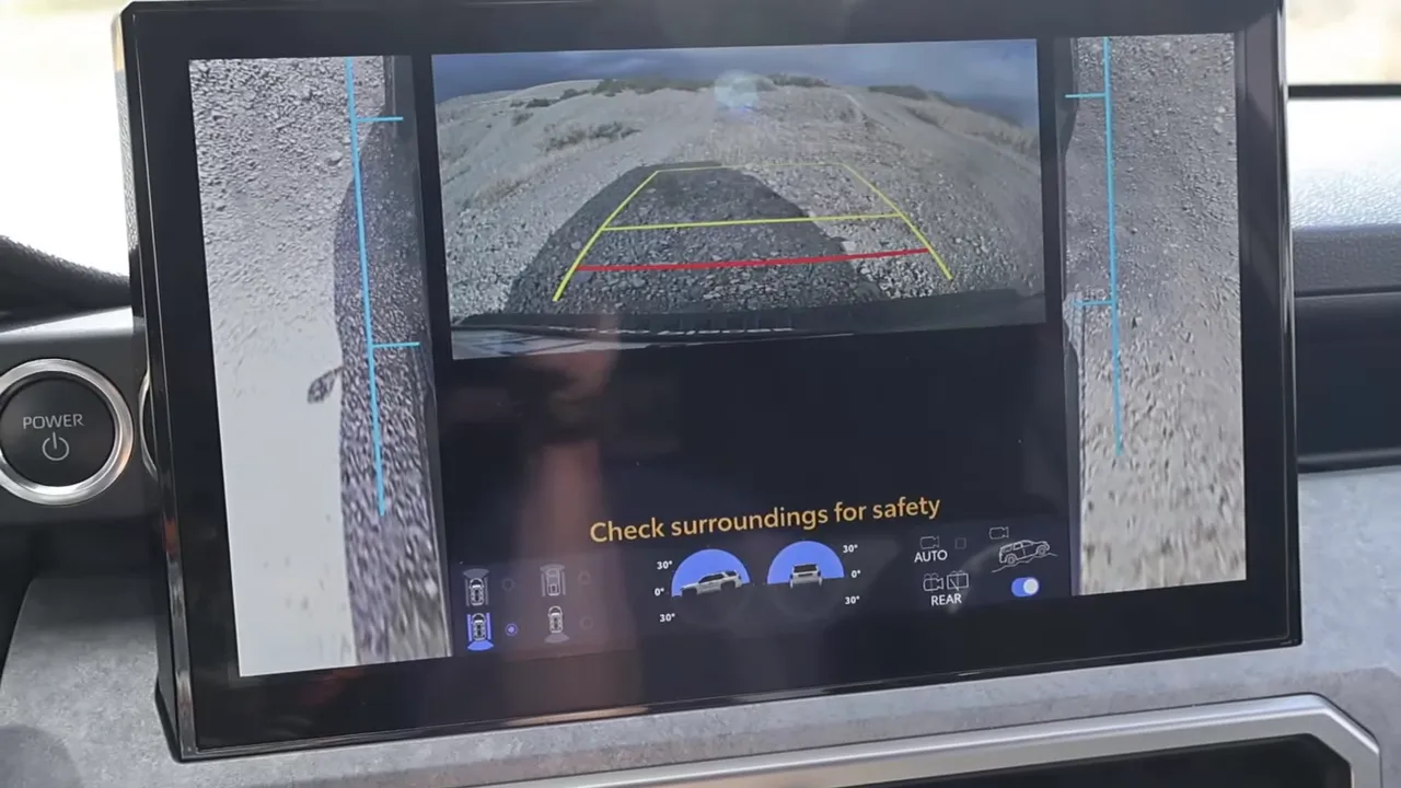 Clear 360-degree rear camera view on Toyota 4Runner display with parking guidelines visible
