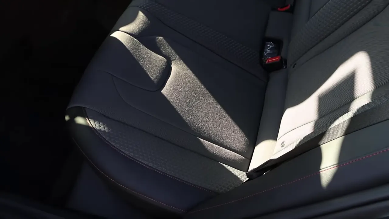 Close-up of rear seat cushion and bolster showing fabric texture, contouring and stitching in the Hyundai Elantra N-Line.