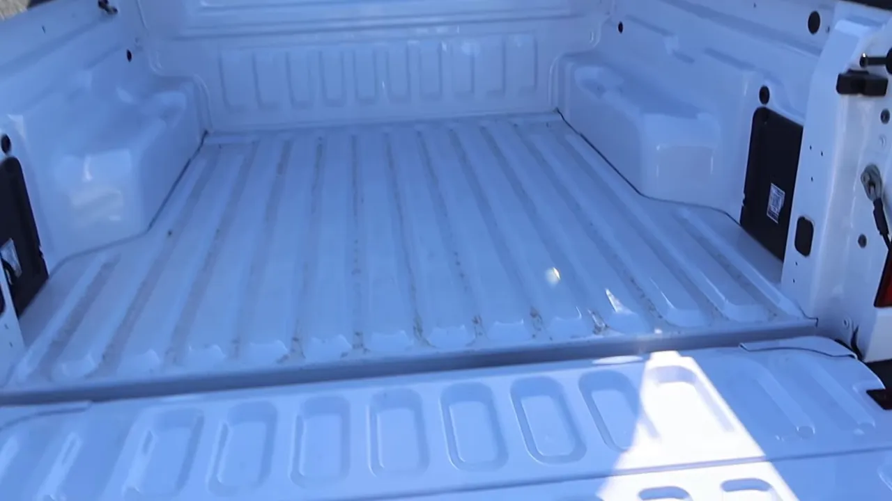 Maverick pickup bed with tailgate lowered showing bed floor and tailgate