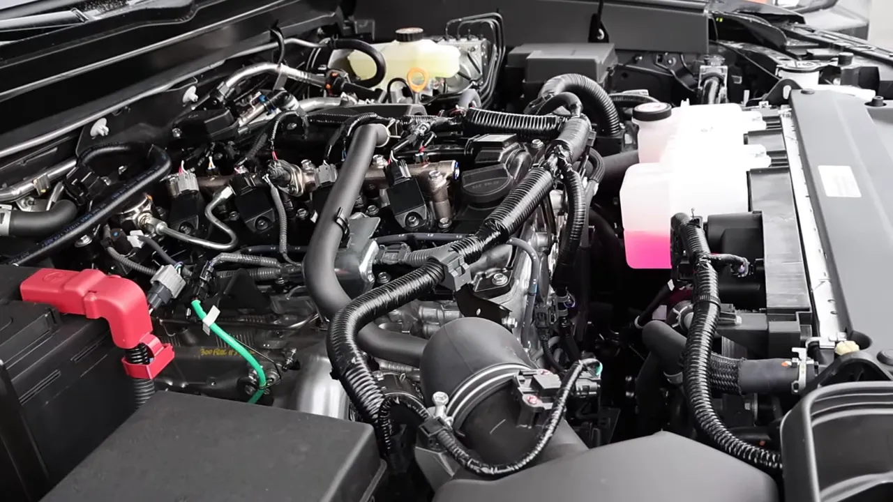 clear Chevy Colorado engine bay showing turbocharged 2.7L components