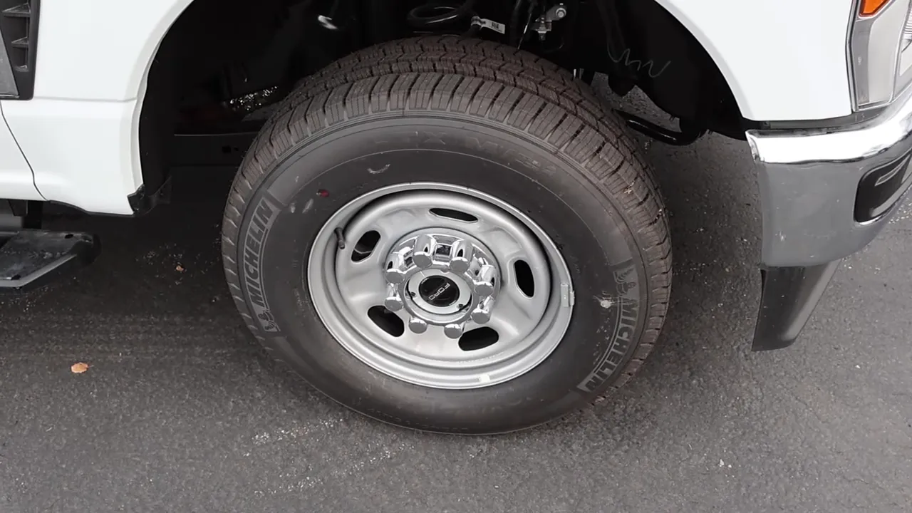 Close-up of Ford F-250 steel wheel with Michelin tire