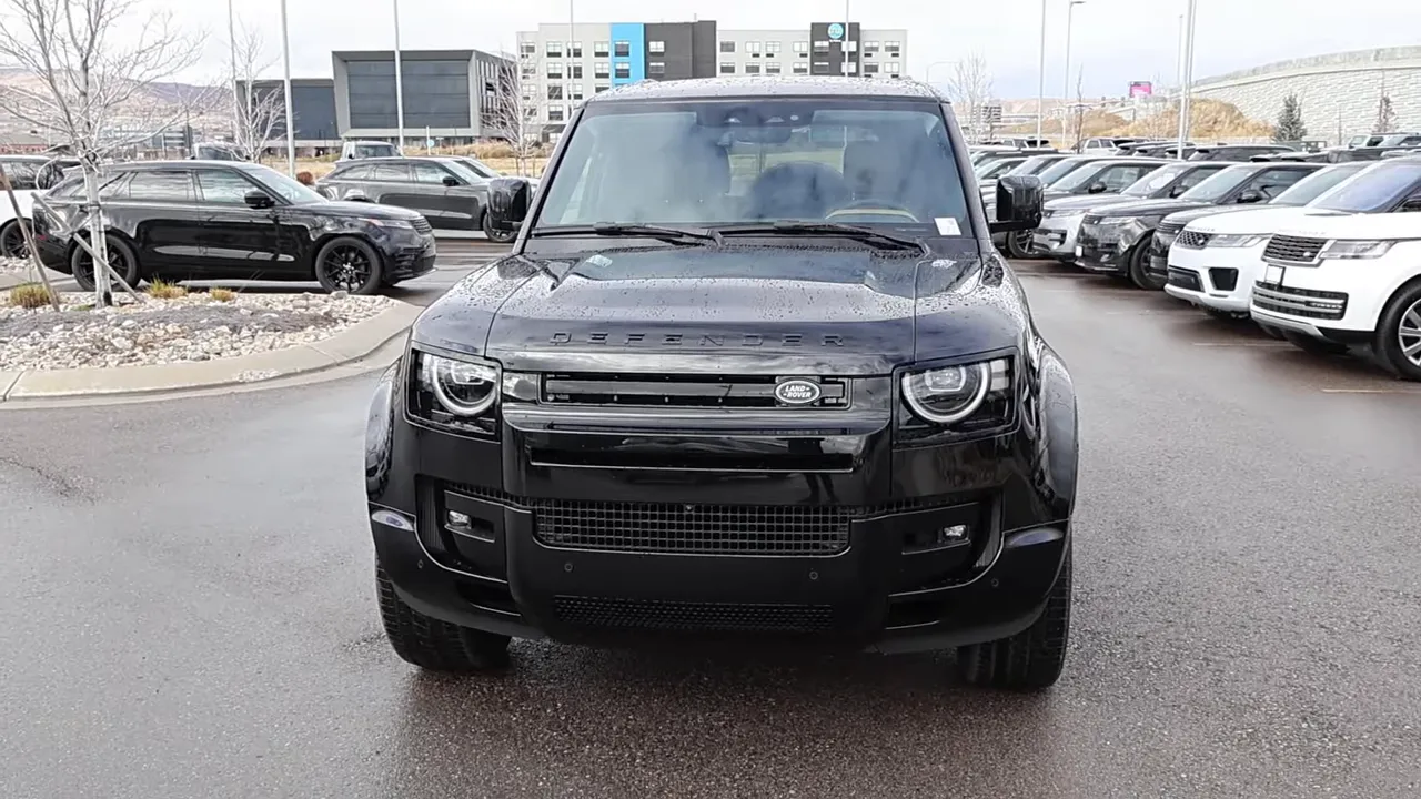 Front view 2026 Land Rover Defender 110 blacked-out grille and headlamps