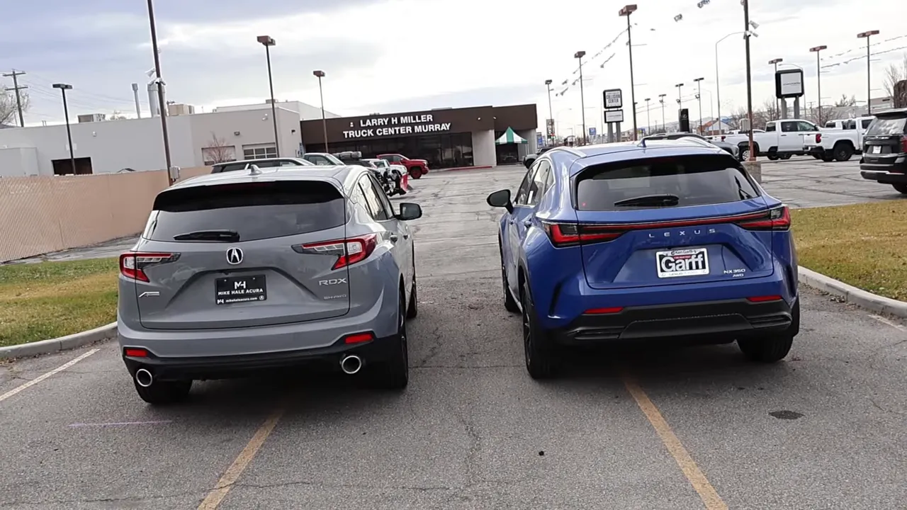 clean rear shot of Acura RDX (left) and Lexus NX (right) showing RDX exhaust tips and NX hidden exhaust