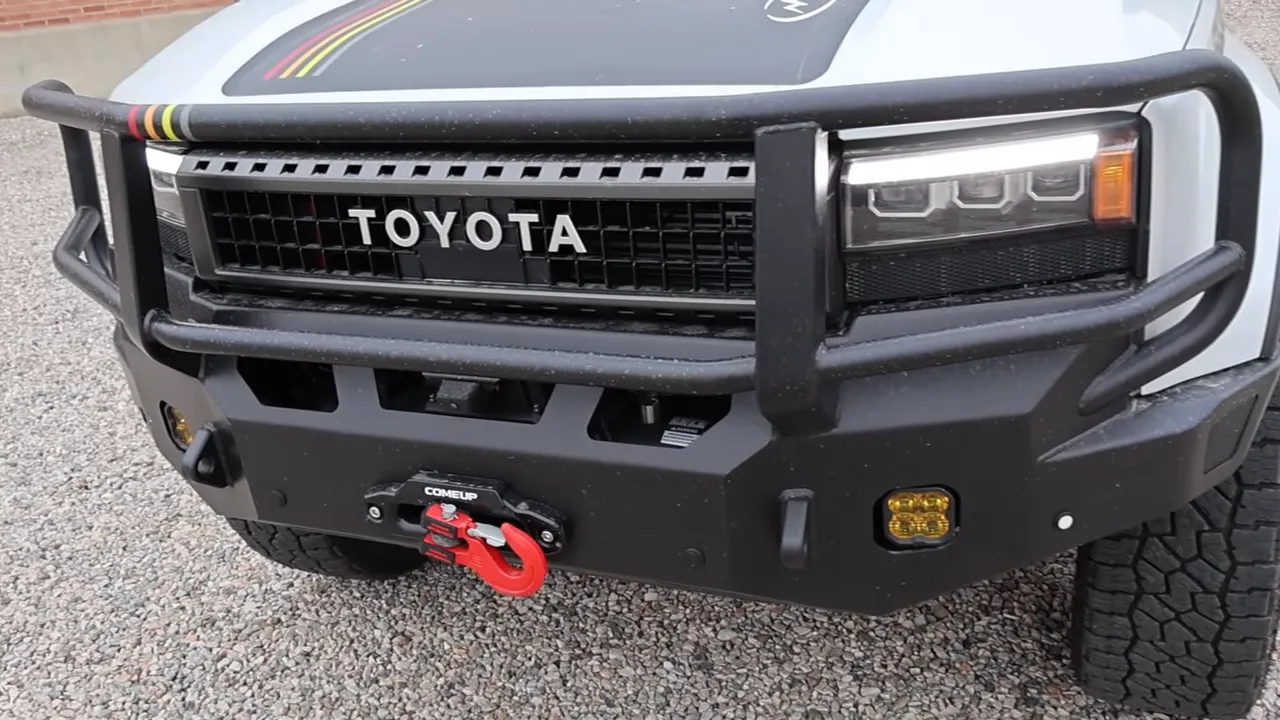 Toyota Land Cruiser front end with steel brush guard, integrated winch and Toyota grille