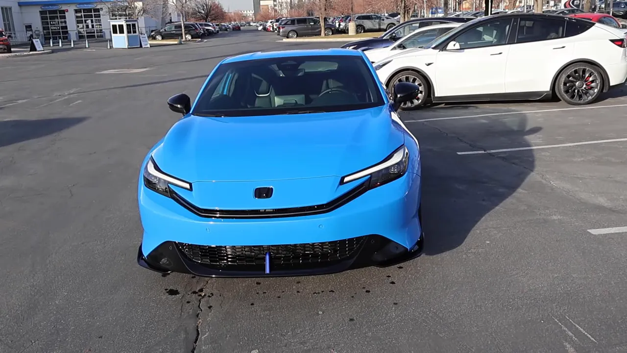 Full frontal 2026 Honda Prelude in Boost Blue showing headlights, grille and splitter