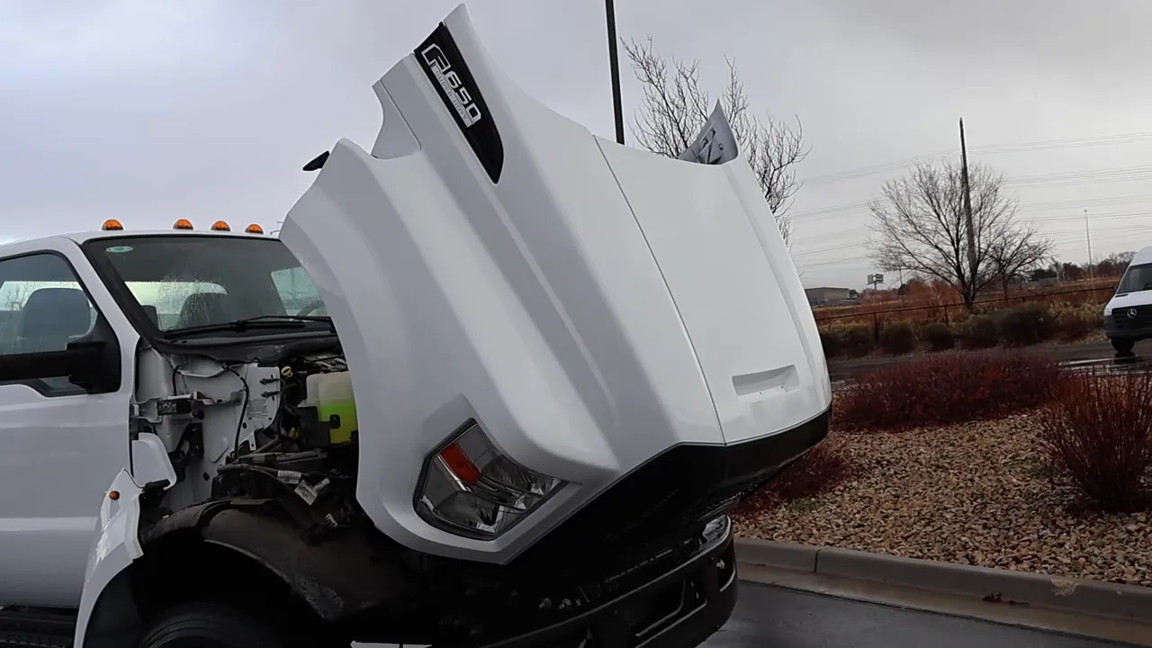 2026 Ford F-650 with hood tilted forward revealing the engine bay and F-650 badge.