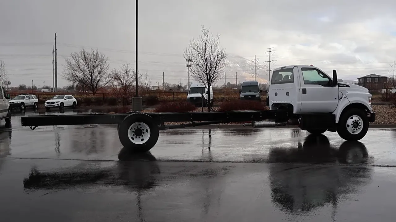 Side profile of a Ford F-650 showing long exposed chassis frame rails