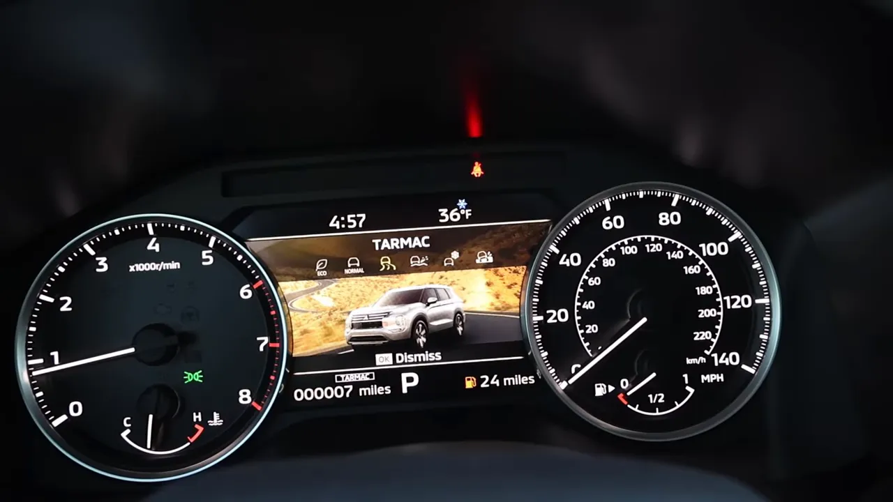 Outlander instrument cluster with center display showing Tarmac drive mode, vehicle image and odometer