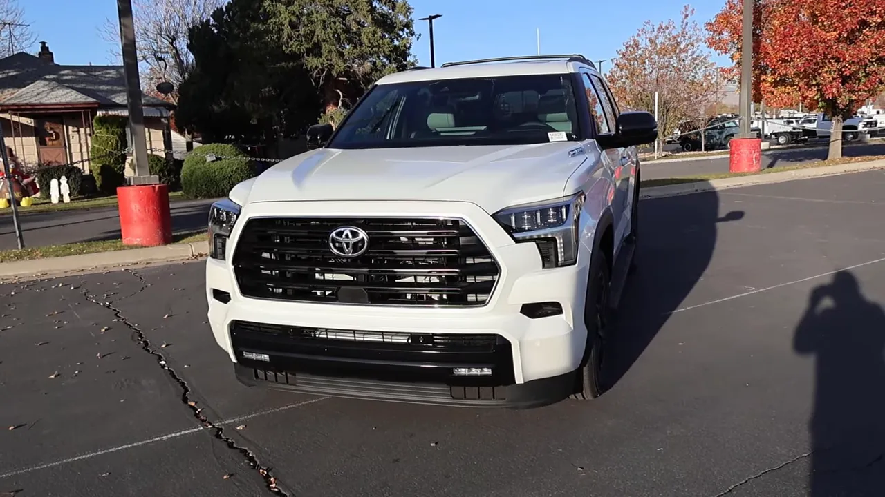 2026 Toyota Sequoia Limited front three-quarter view showing grille, hood and fender flare