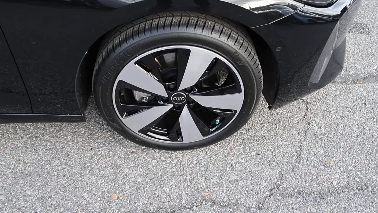close-up of Audi A5 19-inch two-tone wheel showing blade-style spokes