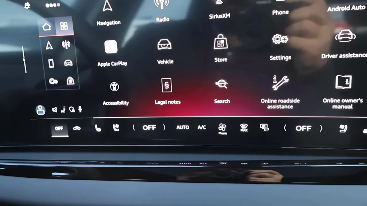 2026 Audi A5 large center touchscreen showing app icons, shortcut bar and climate controls
