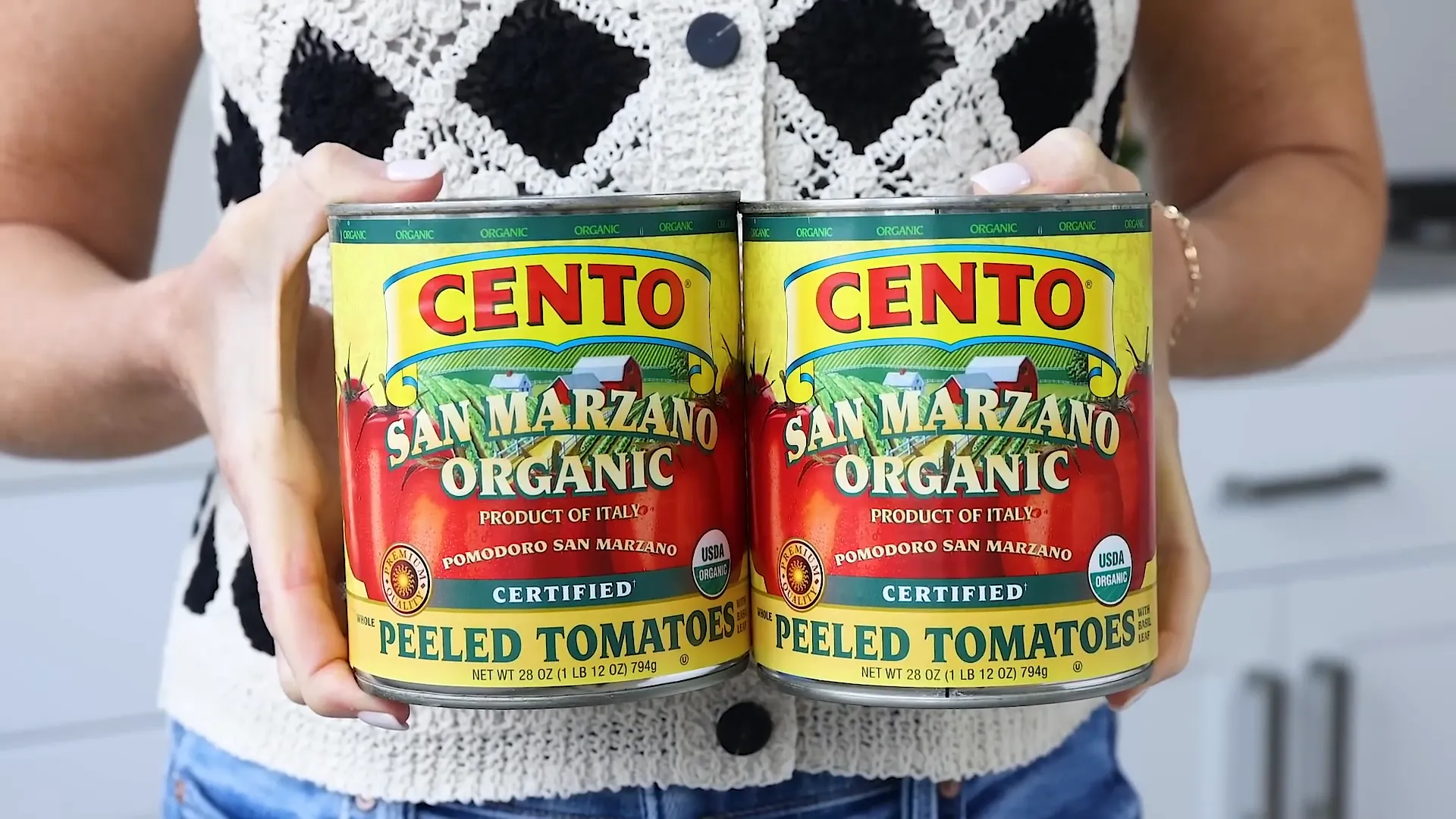 Adding San Marzano tomatoes