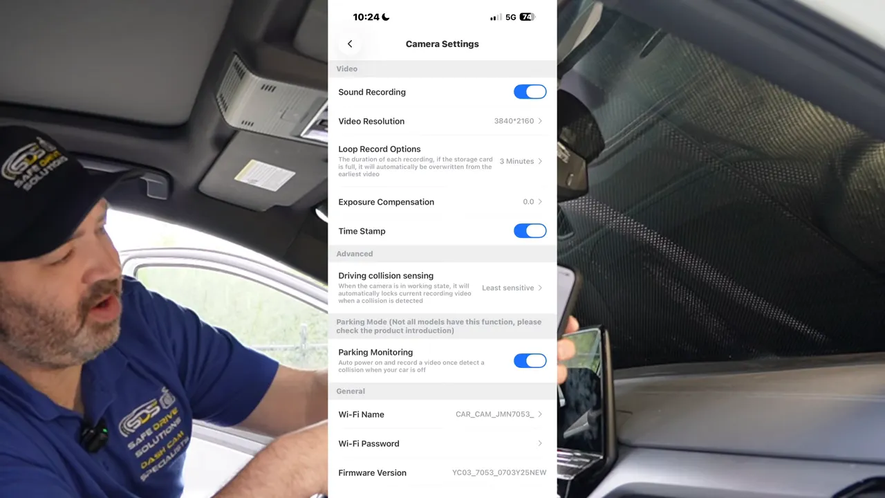 Phone screen showing FitcamX app camera settings menu with toggle options and recording settings