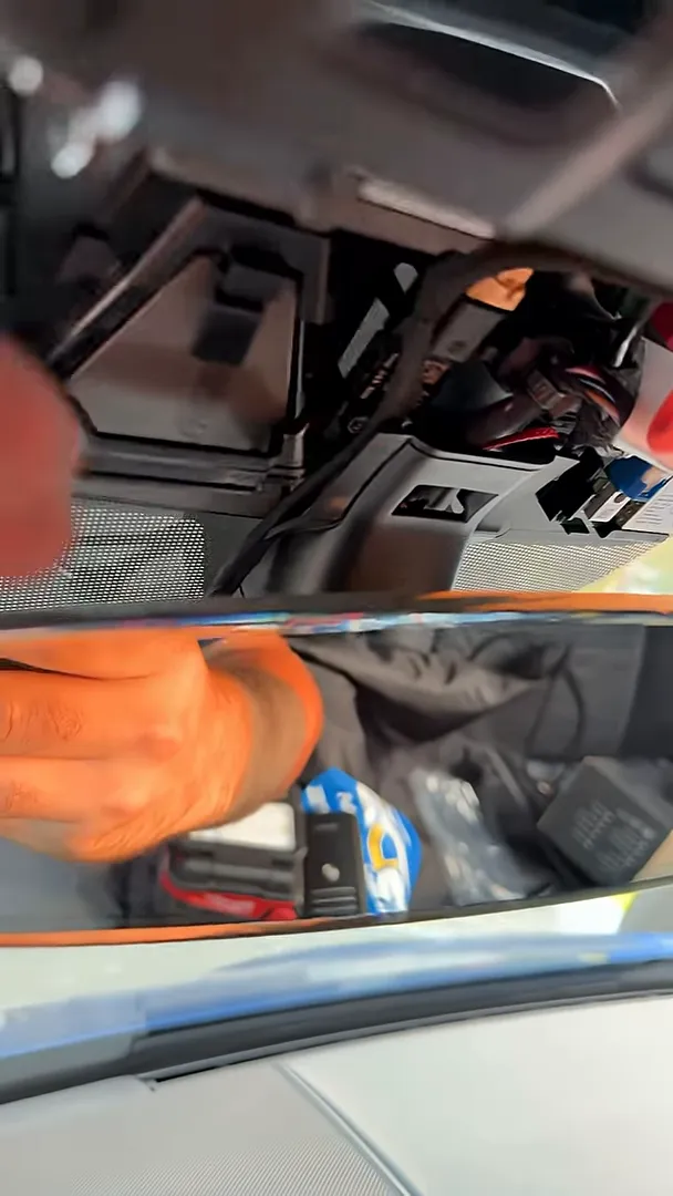 Wiring tucked up in the headliner for the front dash camera