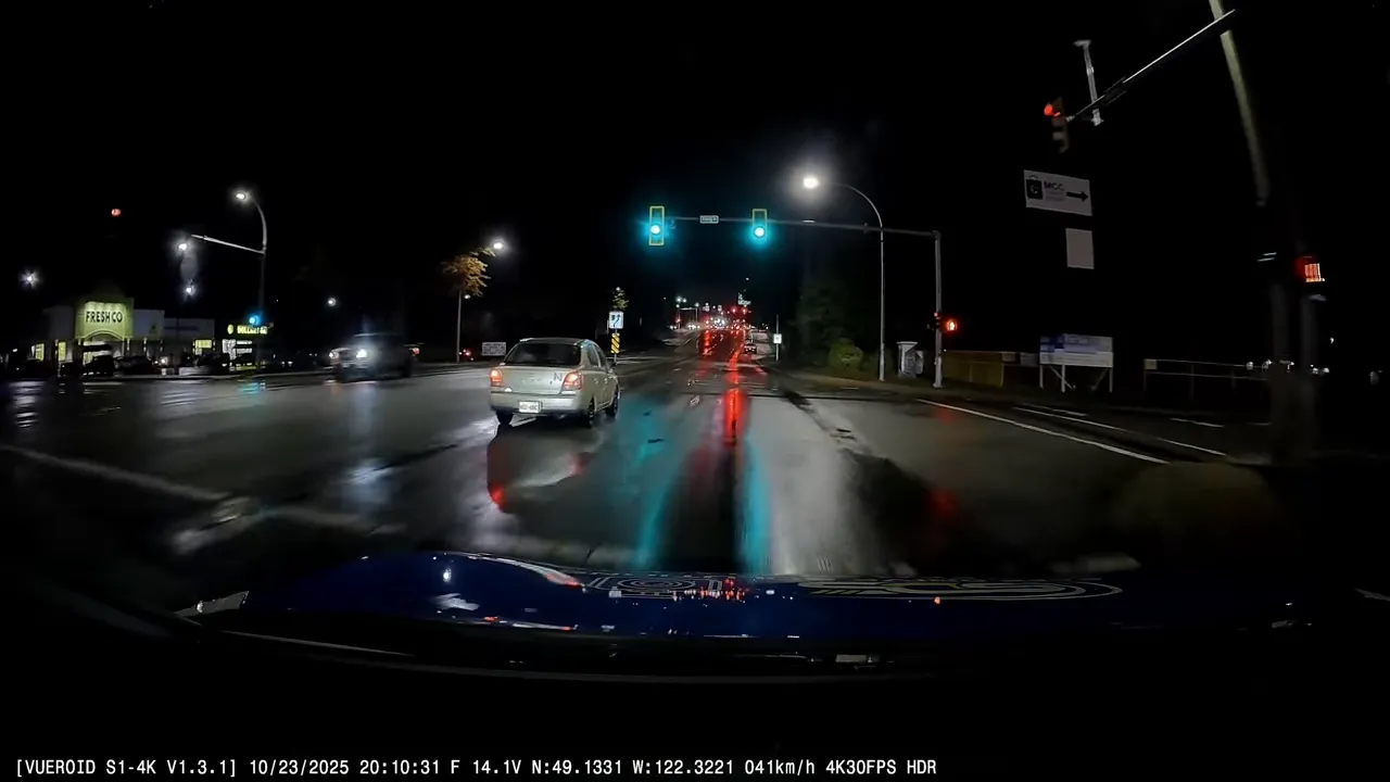 Passing McDonald's and small Toyota Echo, license plate visible