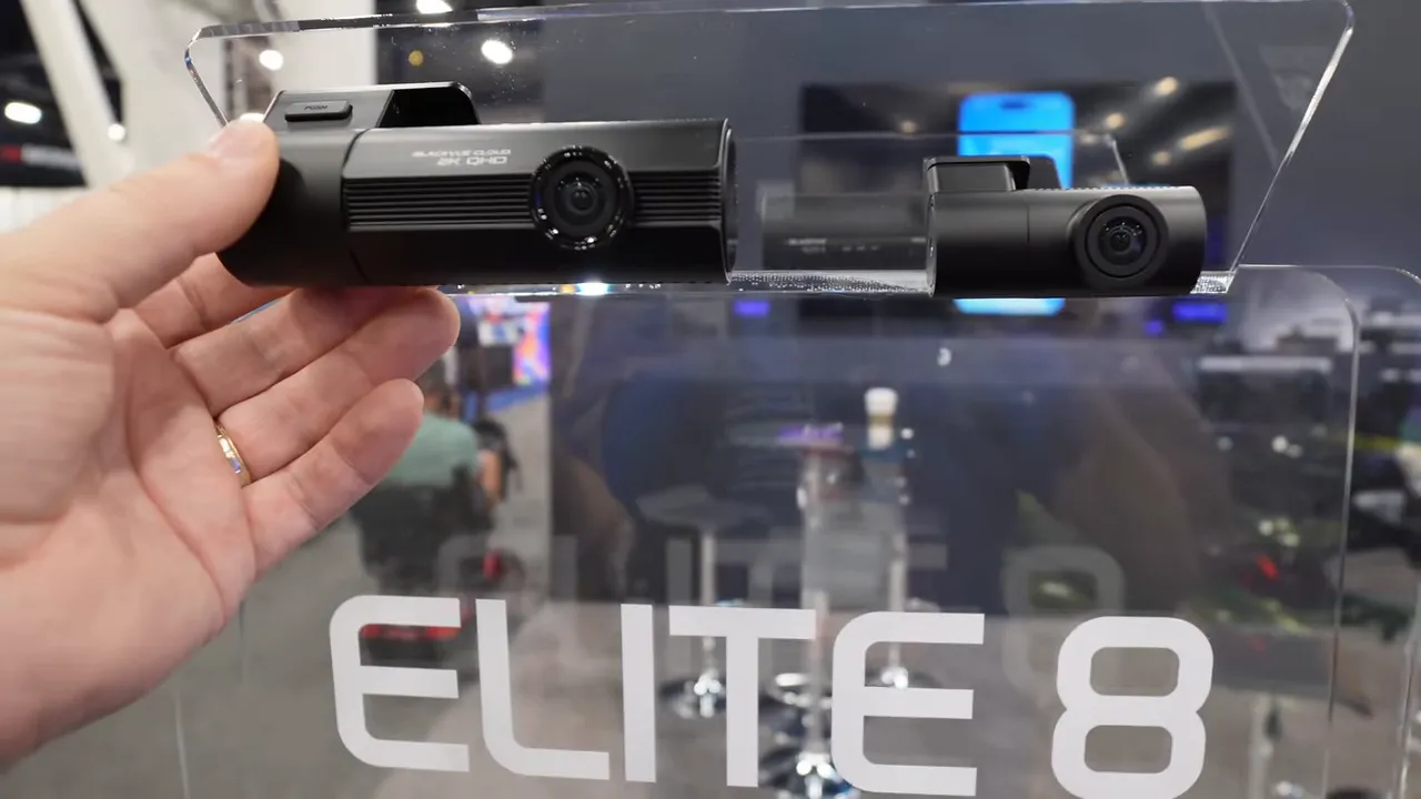 Close-up of BlackVue Elite 8 front and rear camera modules mounted on a clear display with ELITE 8 text.