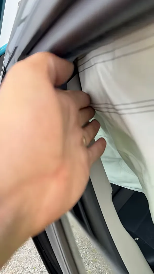 Close-up showing airbag deployment path in front of the B-pillar