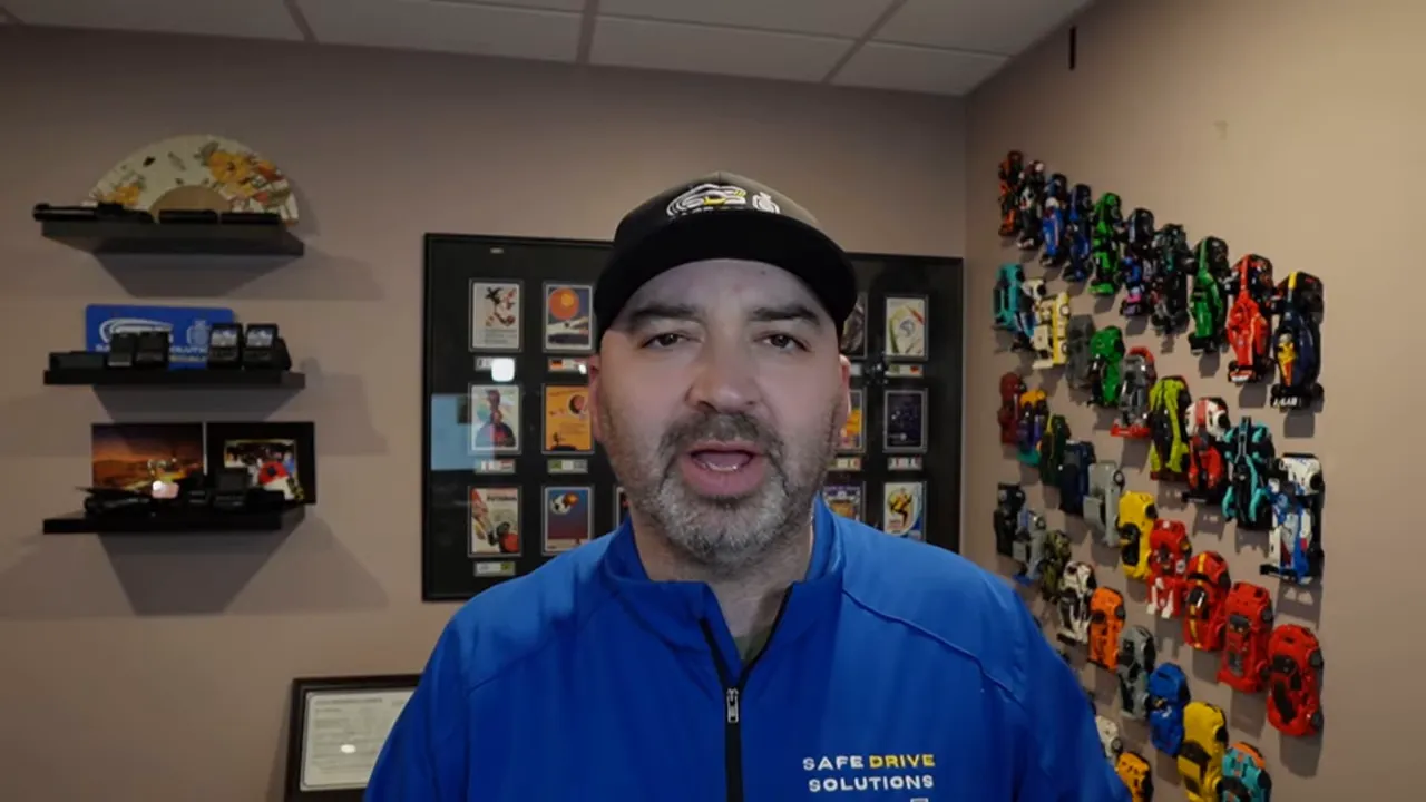 Presenter facing camera summarizing dash cam rain performance and video clarity