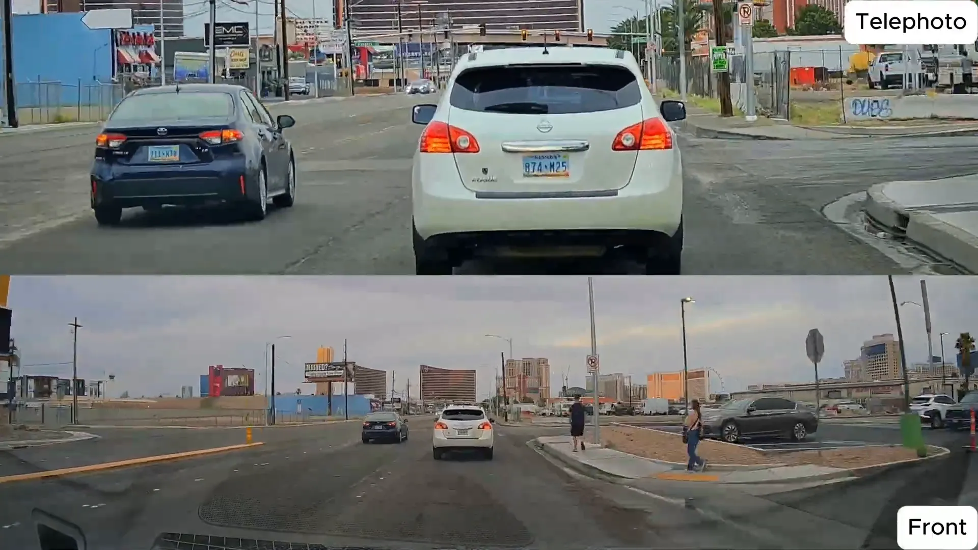 Nissan Rogue car ahead on the road seen through telephoto dashcam
