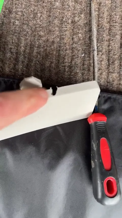 Making a small incision in the factory grommet on Nissan Rogue hatch