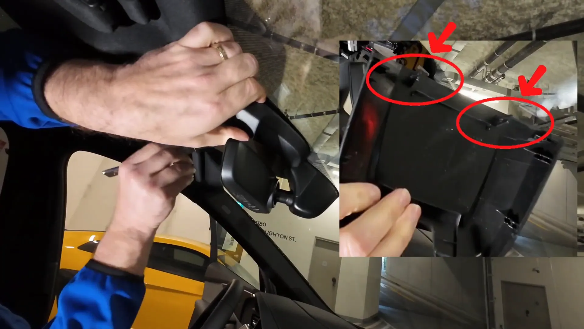 Removing the rearview mirror housing with panel popper tool.