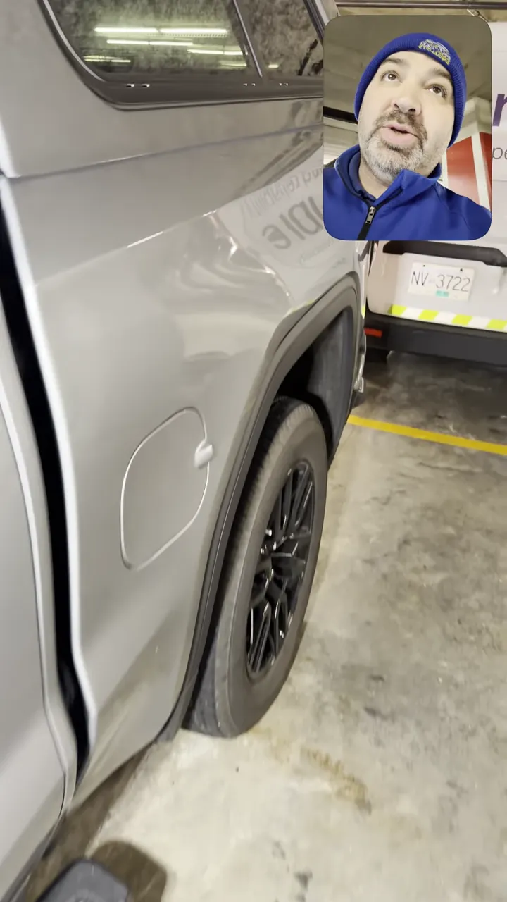 Truck rear quarter panel and wheel well near fuel door