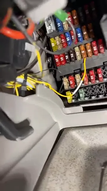 Wires jammed into the fuse box