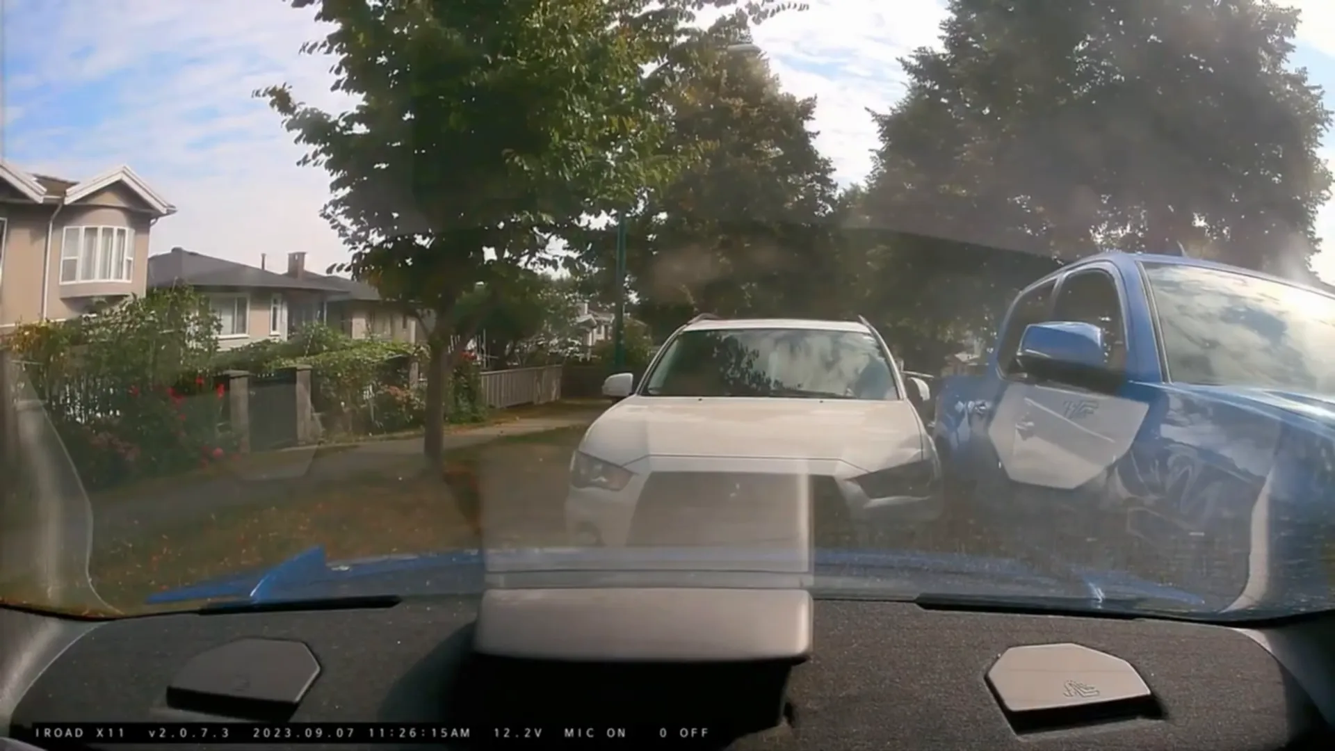 Dash cam recording in parking lot while vehicle is parked