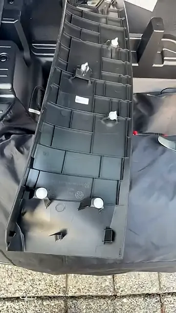 T20 Torx bolt on the hatch panel