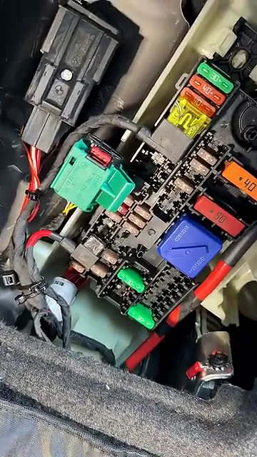 Rear fuse panel showing constant power fuses at the top