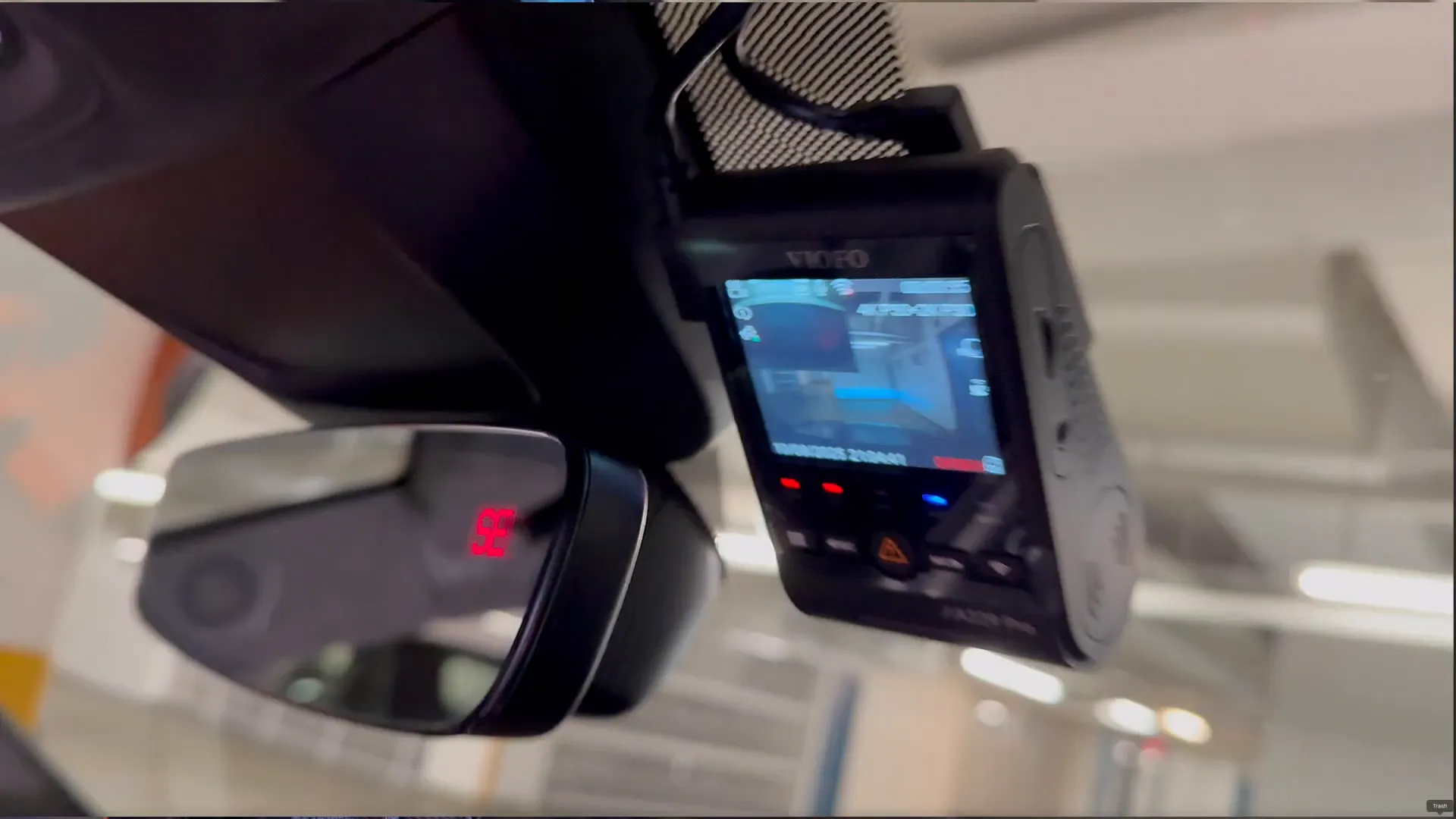 Final view from driver seat showing clean, unobtrusive front mount of the dashcam