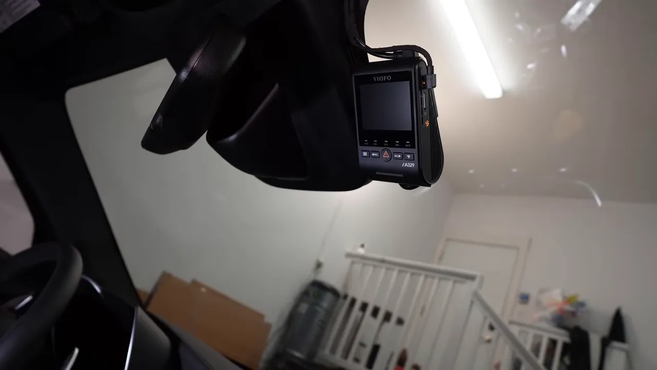 Final view of VIOFO A329S dash cam mounted behind mirror with wiring neatly routed and hidden