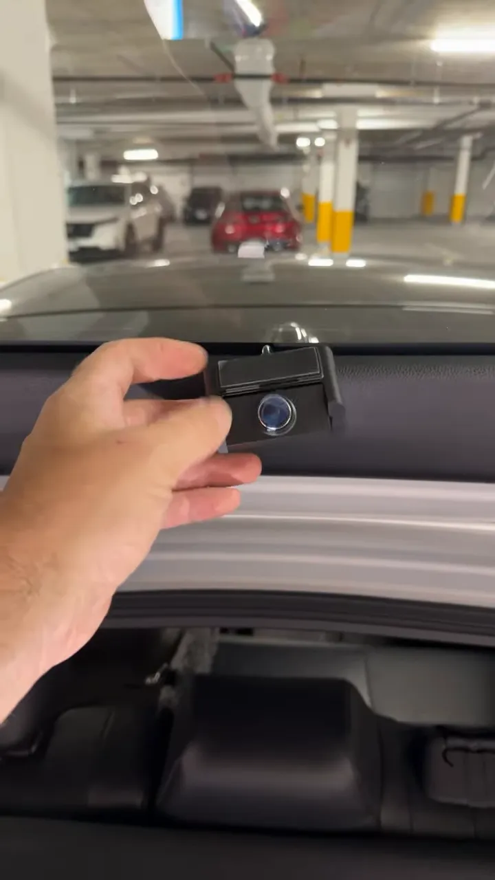 Rear dash camera mounted centrally at the bottom of the Prius Prime rear window