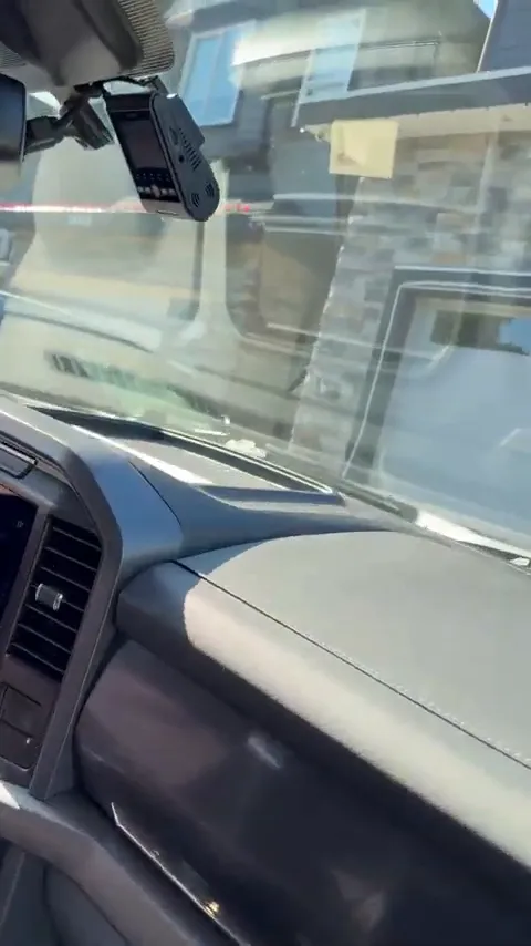 Viofo A229 Plus dash cam hidden behind the rearview mirror of Ford Lightning