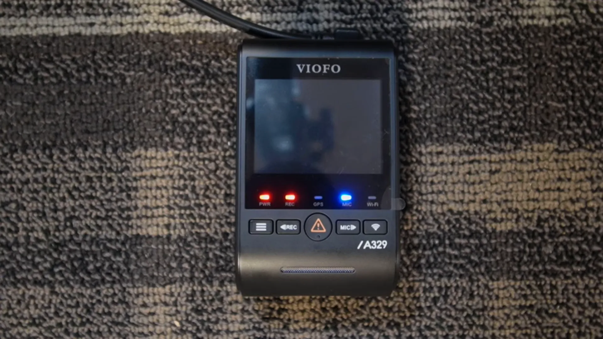 A329S in low-bitrate parking mode with LEDs on indicating parking recording