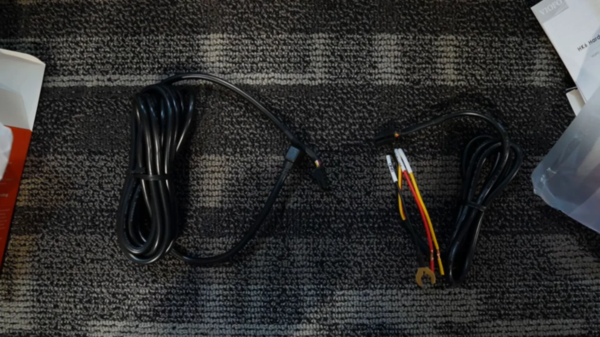 HK6 hardwire kit showing two detachable cables and Bluetooth module