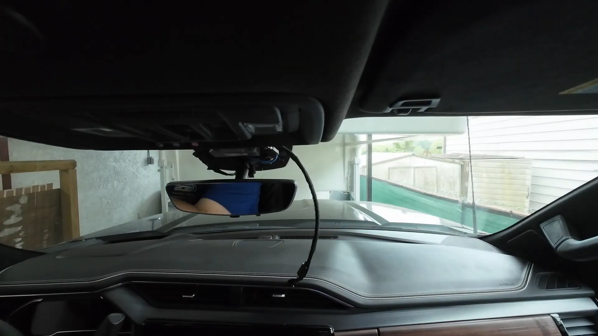 Running dash cam wiring behind the vehicle headliner