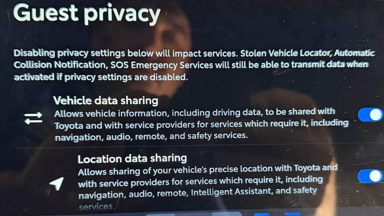 Toyota infotainment screen showing guest privacy settings with vehicle data and location sharing toggles