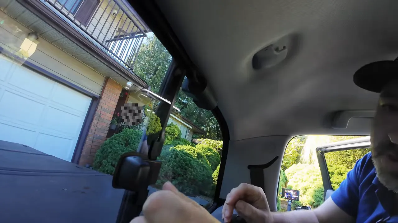 Rear dash camera mounted high on the fixed rear window