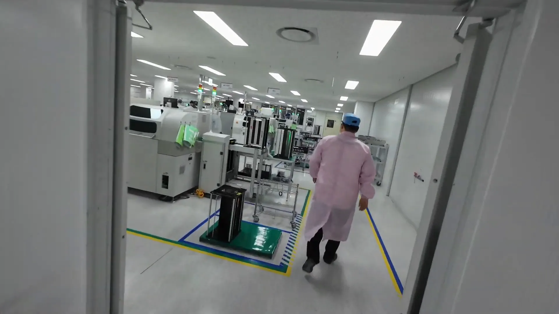Walking through the busy factory floor