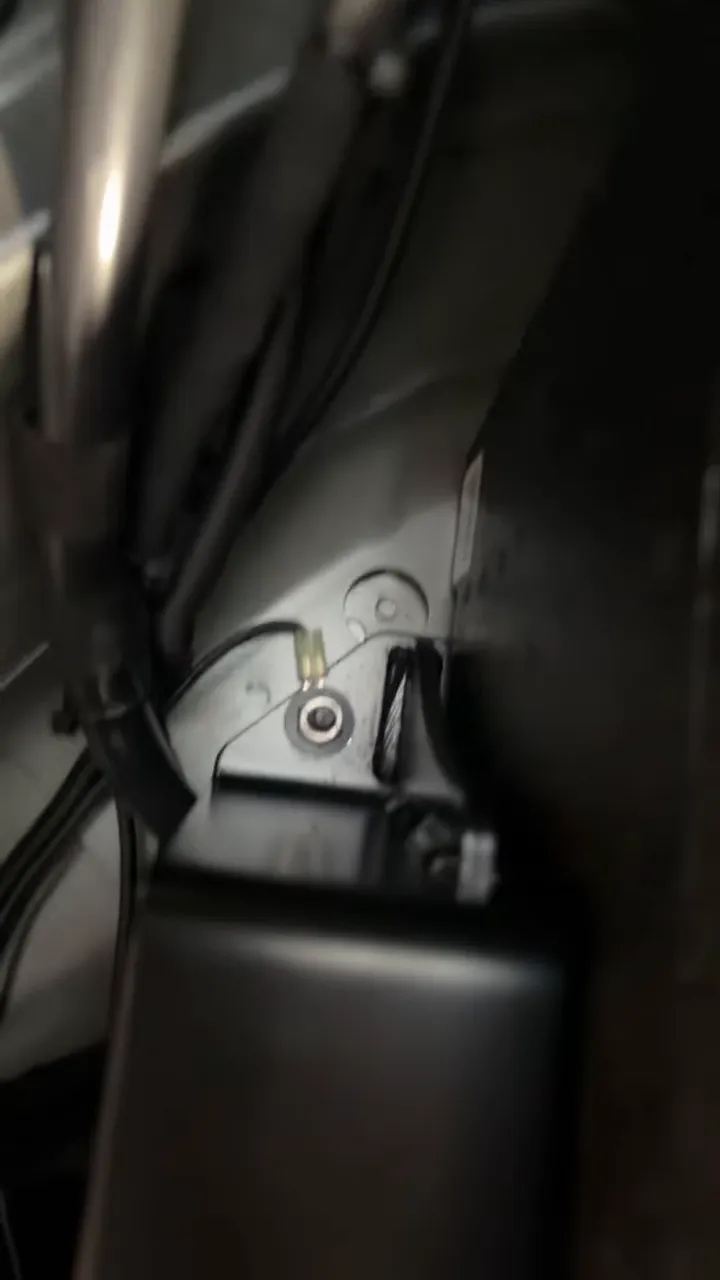 factory ground point with ring terminal attached near rear cargo area