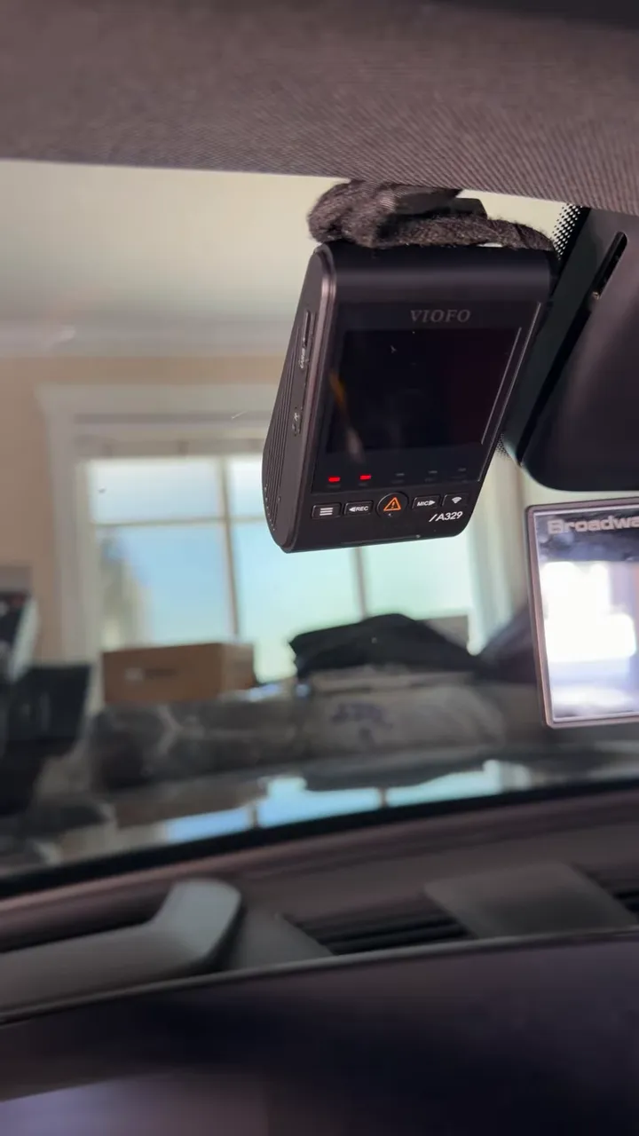 front dash camera mounted near windshield on driver side
