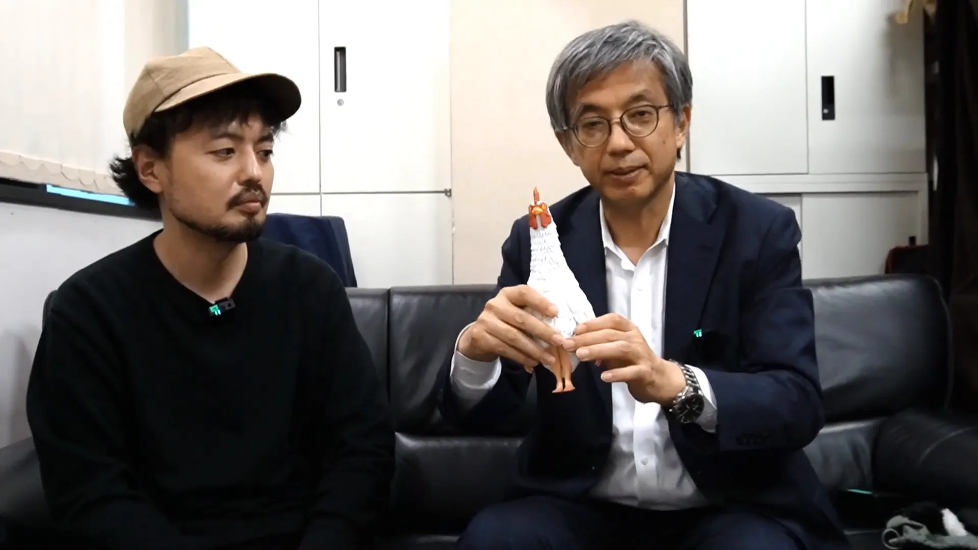 インタビューで柿沼宏樹氏と田中が話す様子