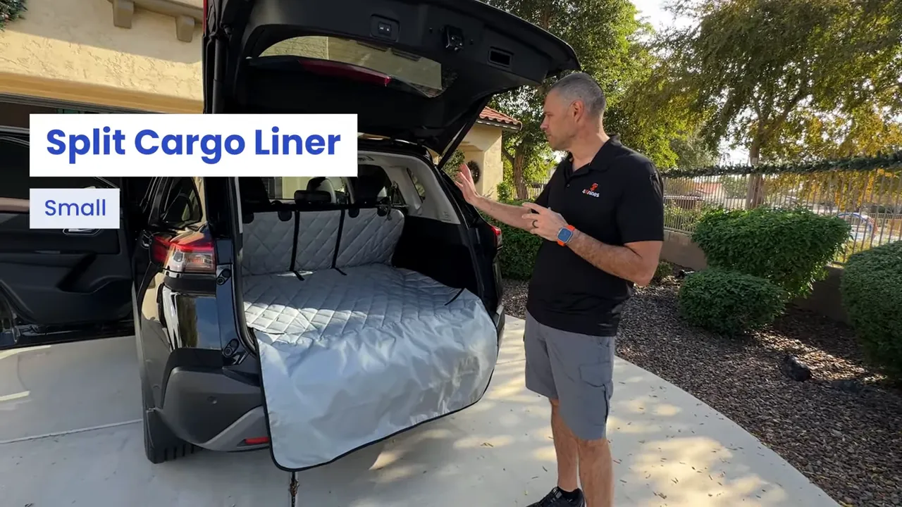 Open Nissan Rogue cargo area with quilted split cargo liner and bumper flap