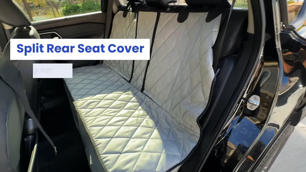 Quilted split rear seat cover installed across the Nissan Rogue rear bench