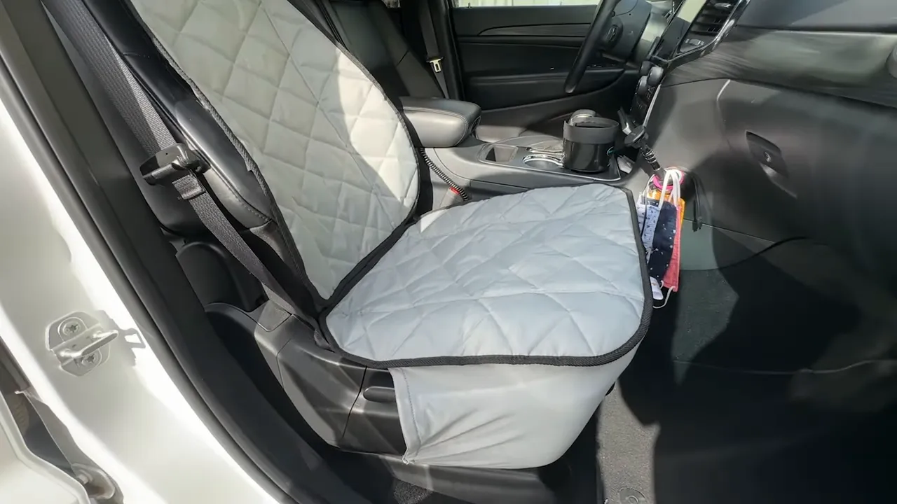 Gray quilted bucket seat cover fitted on the Jeep Grand Cherokee front passenger seat
