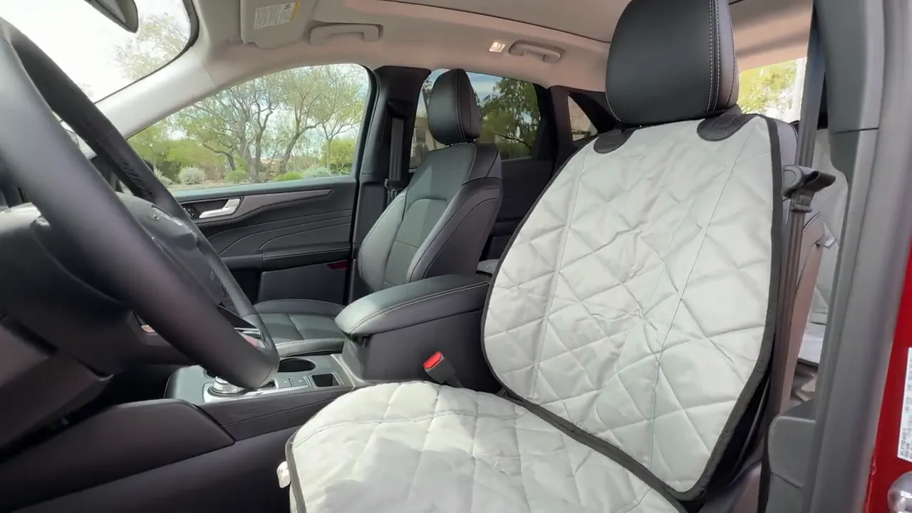 Gray quilted front bucket seat cover installed on the Ford Escape front passenger seat