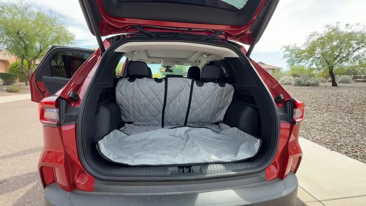 Open Ford Escape cargo area with a gray split cargo liner covering the floor
