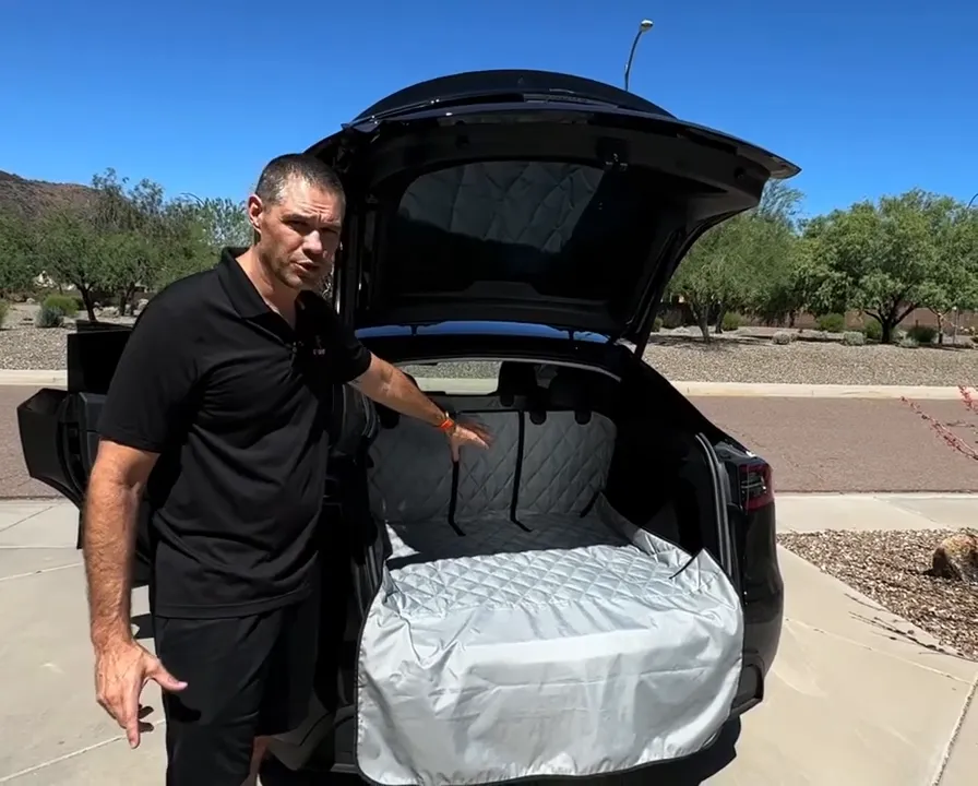 Tesla Model Y cargo area with a quilted split cargo liner and bumper flap