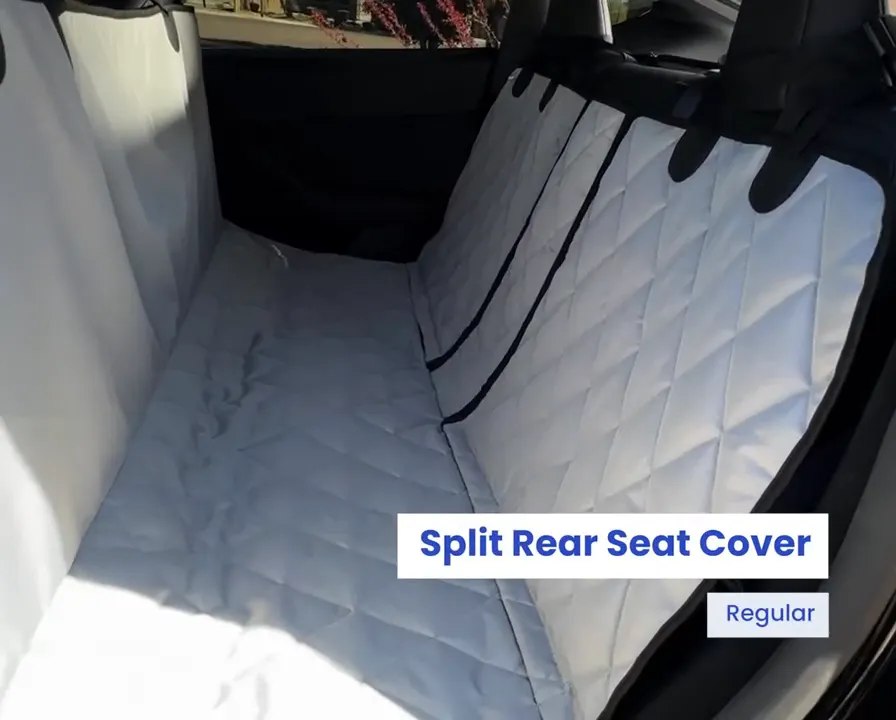 Quilted split rear seat cover installed across the Tesla Model Y back seat